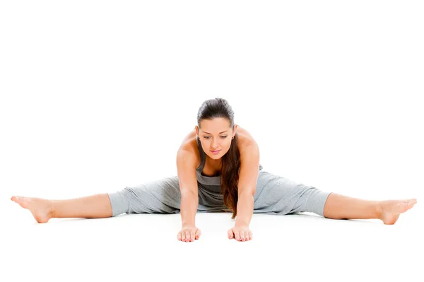 Mooie vrouw doen flexibiliteit oefening — Stockfoto