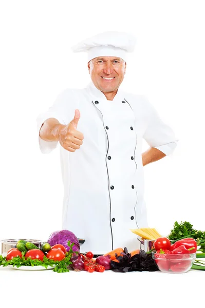 Улыбающийся шеф-повар показывает большие пальцы вверх — стоковое фото