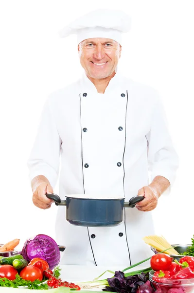 Smiley cook holding saucepan — Stock Photo, Image