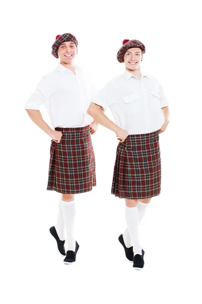 Две улыбающиеся танцовщицы в шотландской национальной одежде — стоковое фото