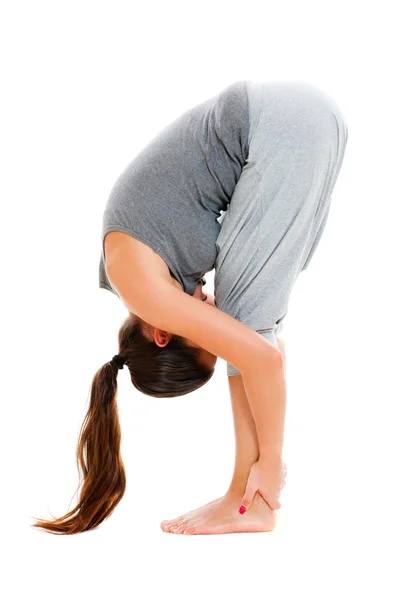 Giovane donna che fa esercizio di stretching — Foto Stock