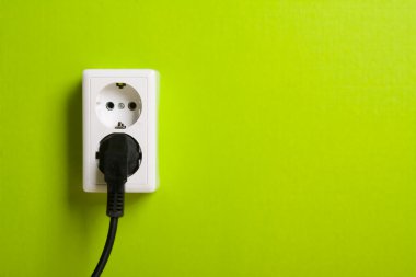 White electric socket on the wall. clipart