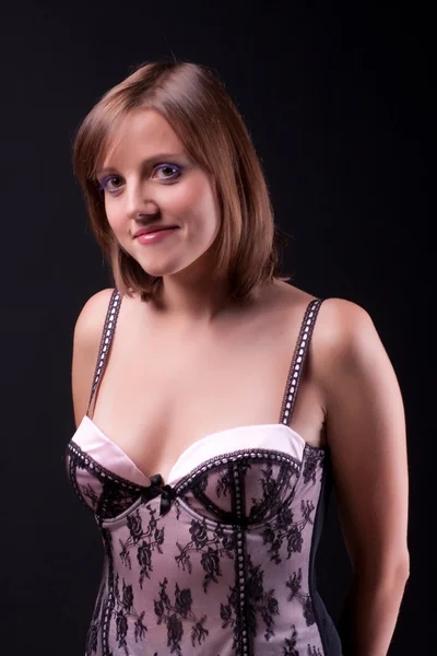 Girl in a corset. — Stock Photo, Image
