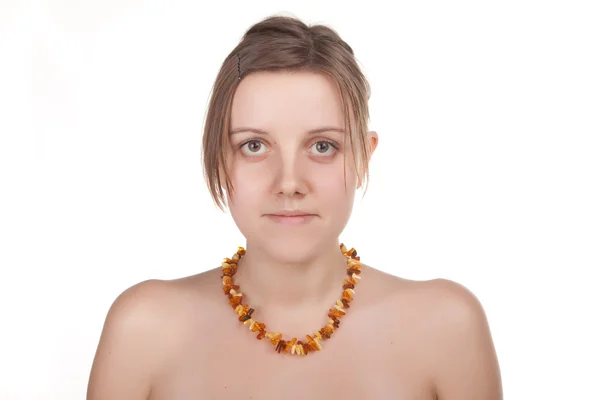 Amber jewelry on female neck. — Stock Photo, Image