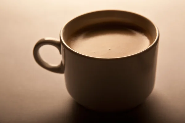 Una taza de café en la mesa. De cerca. . —  Fotos de Stock