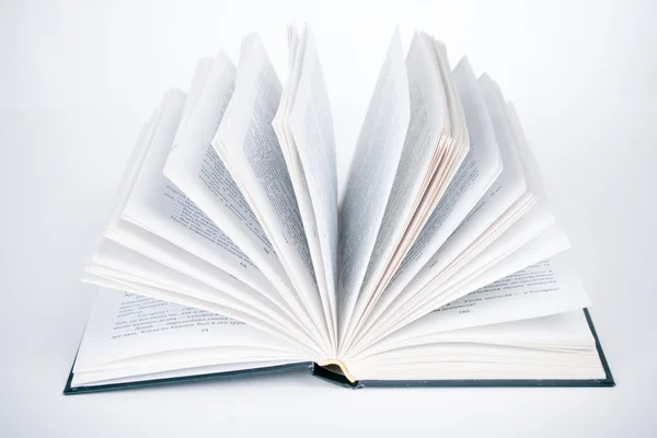 Livro aberto sobre fundo branco — Fotografia de Stock