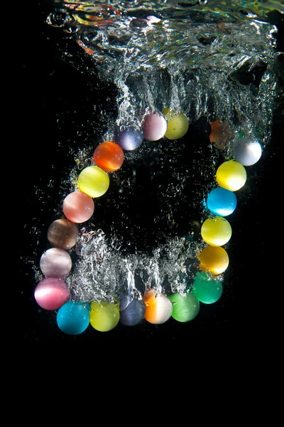 Perlen unter Wasser — Stockfoto