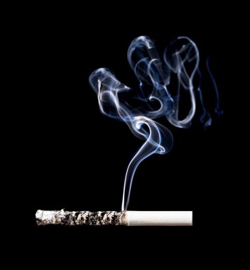 Smoking cigarette. Isolated on black. clipart