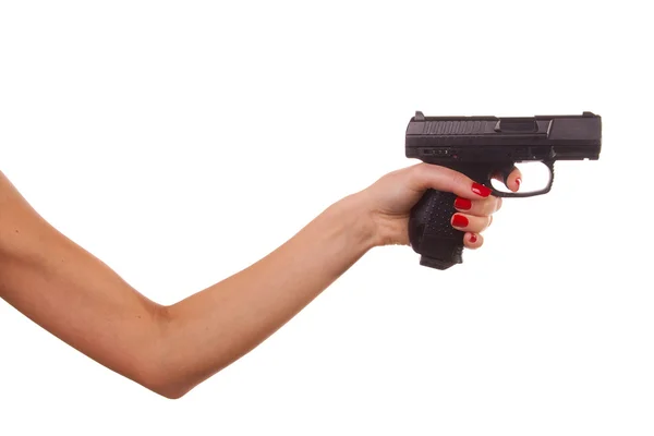 Женская рука с пистолетом — стоковое фото