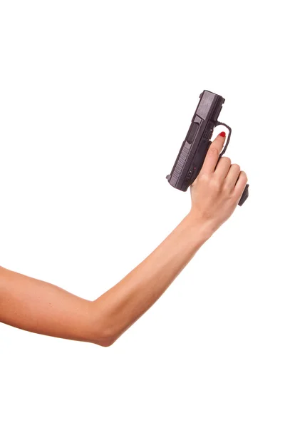 La mano de la mujer con un arma — Foto de Stock