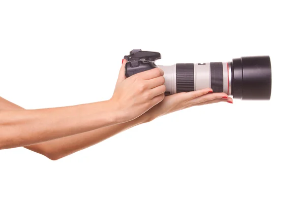 stock image Women's hands holding the camera.