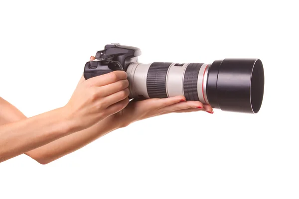 stock image Women's hands holding the camera.