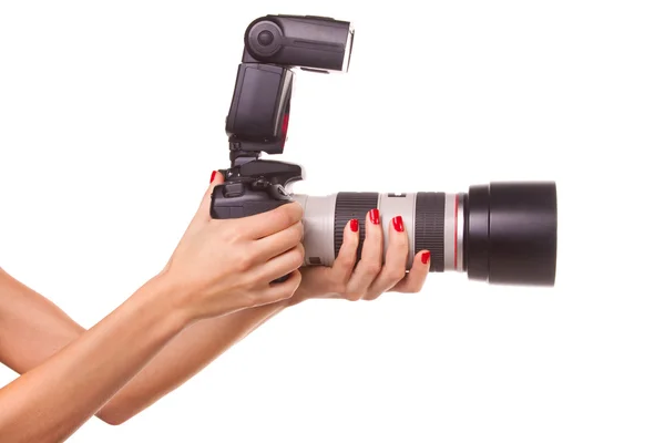 Stock image Women's hands holding the camera.