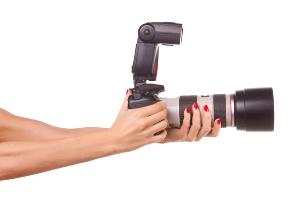 stock image Women's hands holding the camera.