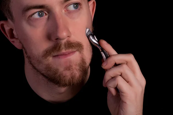 男性の顔を剃るします。クローズ アップ. — ストック写真