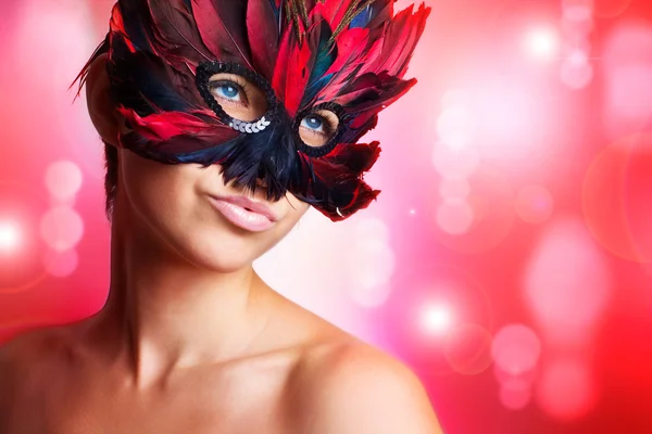 Portret van mooie vrouw in masker — Stockfoto