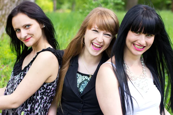 Three smiling girl-friends — Stock Photo, Image