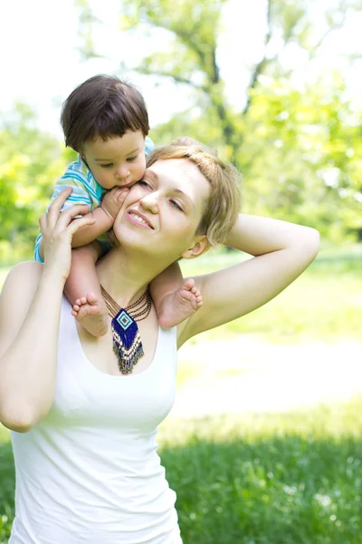 Mother with son relaxing outdoor — Stock Photo, Image