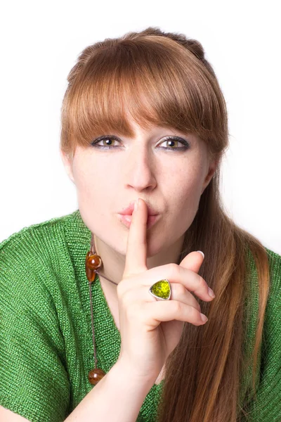 Femme avec doigt sur les lèvres — Photo