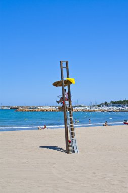 Vigilante de la playa en L'escala, Cataluña, Spain clipart