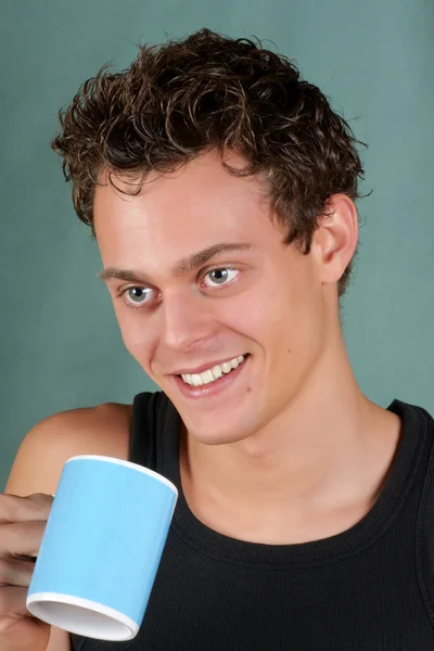 Young man with mug — Stock Photo, Image