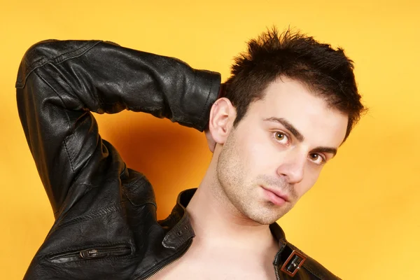 Young man with black leather jacket — Stock Photo, Image