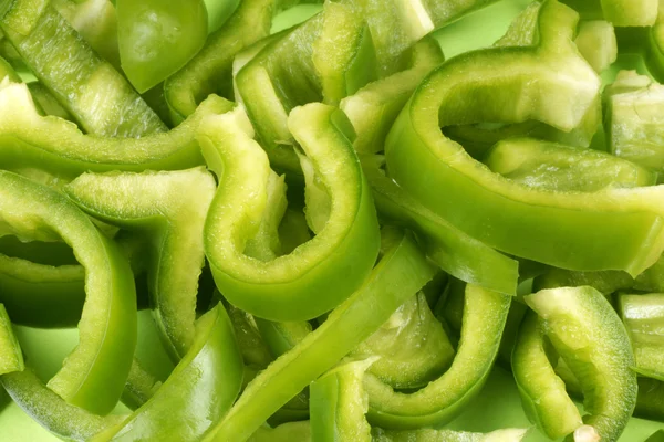 Green bell pepper background — Stock Photo, Image