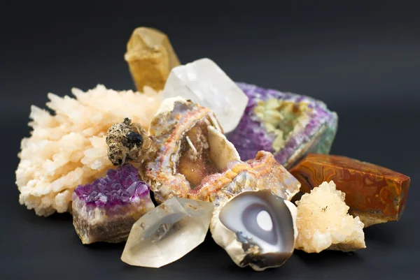 Composition of natural gem stones on a black background — Stock Photo, Image