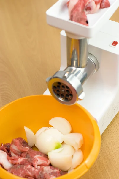 stock image Meat through a meat grinder for force meat