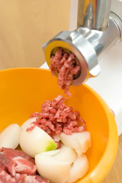 Meat through a meat grinder for force meat — Stock Photo, Image