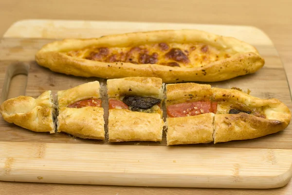 Turkish food pide, yeast dough cheese and butter. — Stock Photo, Image