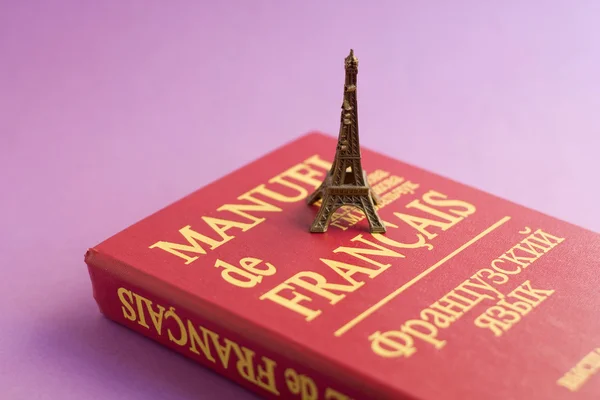 Textbook French and the Eiffel Tower. Stock Image