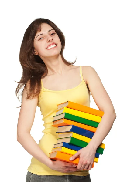 Lächelndes junges Mädchen mit Büchern — Stockfoto