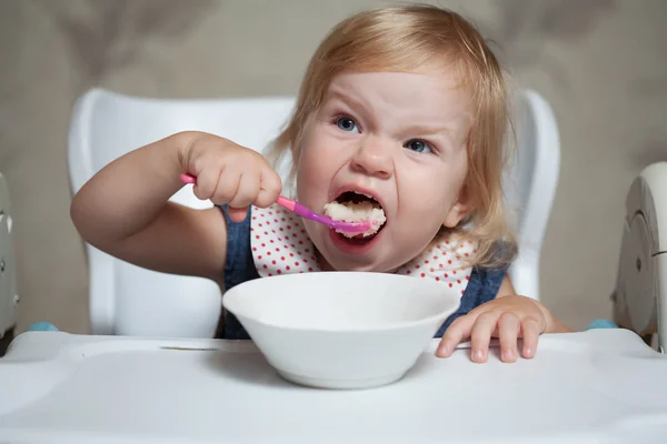 Little hungry girl — Stock Photo, Image