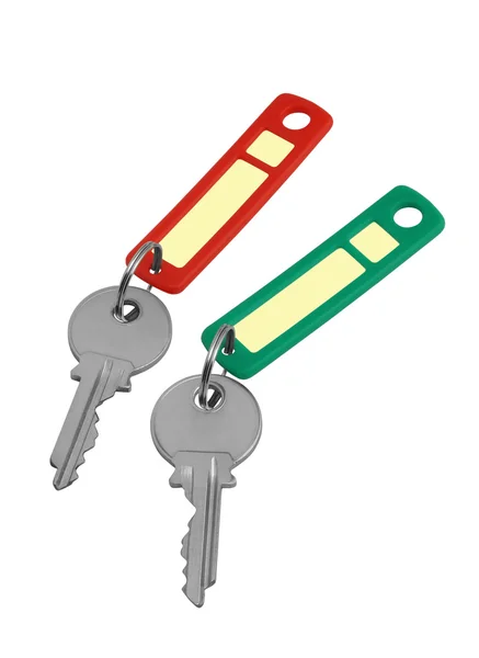Два ключа с красной и зеленой метками — стоковое фото