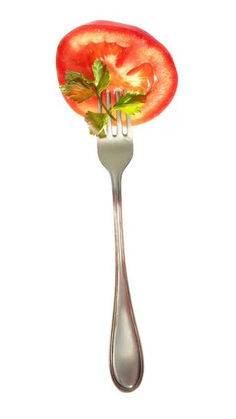 Rebanada de tomate fresco en el tenedor — Foto de Stock