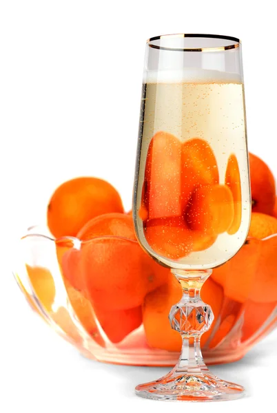 stock image Snifter of champagne with tangerines