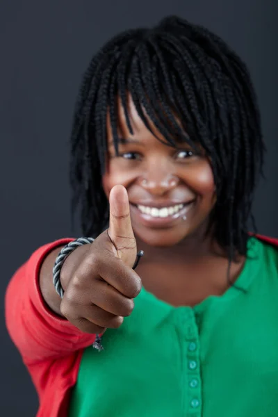 African woman with thumbs up — Stok fotoğraf