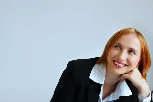 Reddhead businesswoman in jacket — Stock Photo, Image