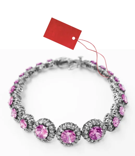 Bracelet with price tag — Stock Photo, Image