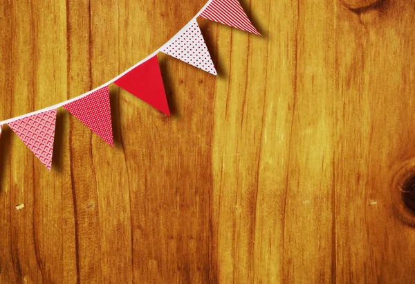Red and white flags on wood — Stock Photo, Image