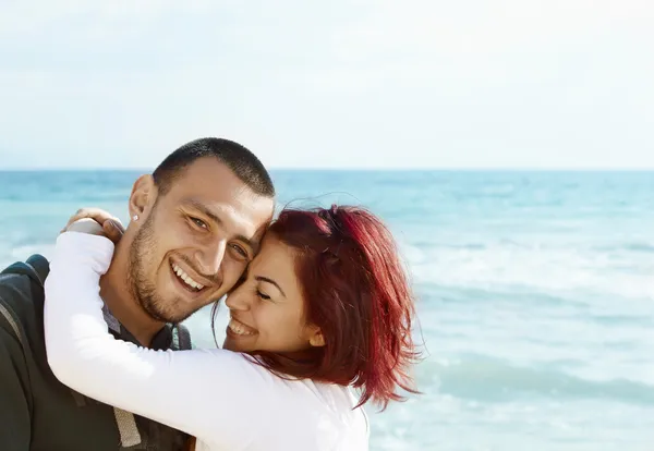 Young Turkish couple on beach — Stock Photo, Image