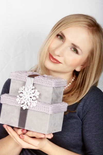 Woman with luxury gift boxes — Stock Photo, Image