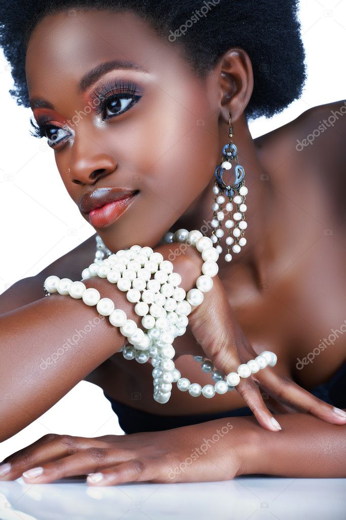 South African woman with pearls.