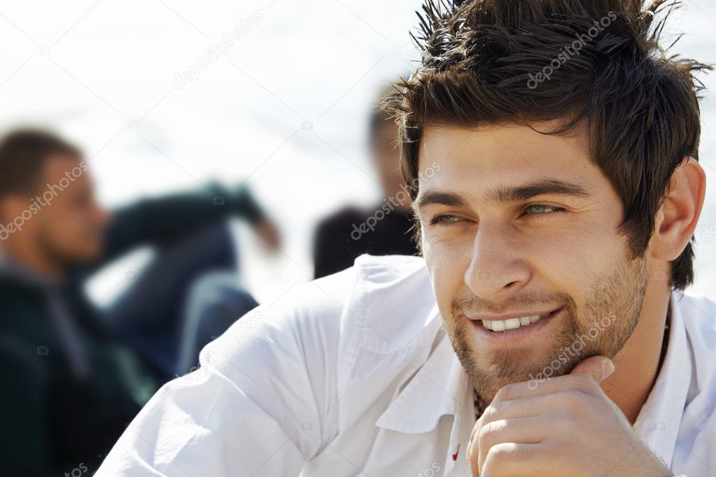 Handsome happy man with mullet haircut