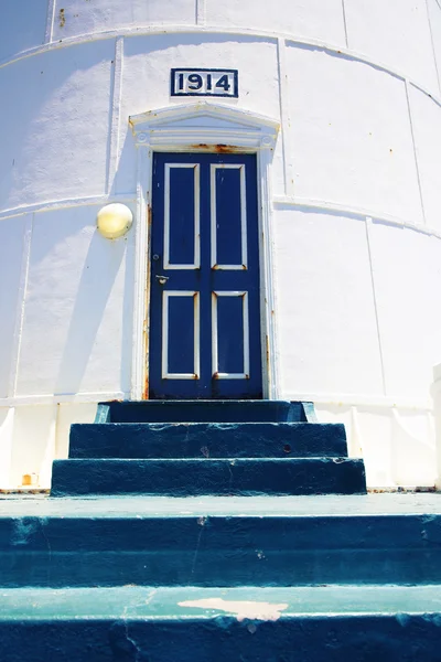 Lighthouse entrance with old steps — Stock Photo, Image