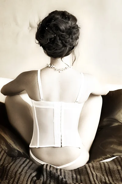 Giovane donna in corsetto — Foto Stock