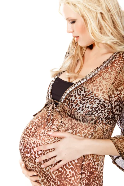 Беременная женщина в платье для материнства — стоковое фото