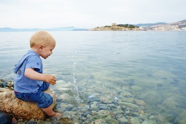 Little boy in the sea clipart