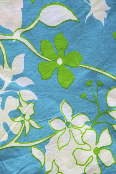 Cotton material with leaf and flower patterns. — Stock Photo, Image